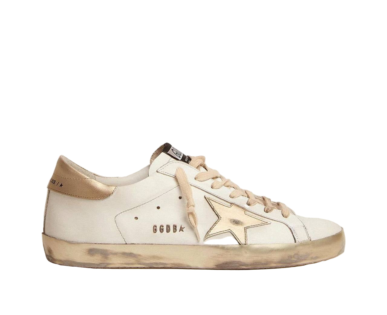 A white and beige Golden Goose Super-Star sneaker with a star patch on the side and lace-up closure.