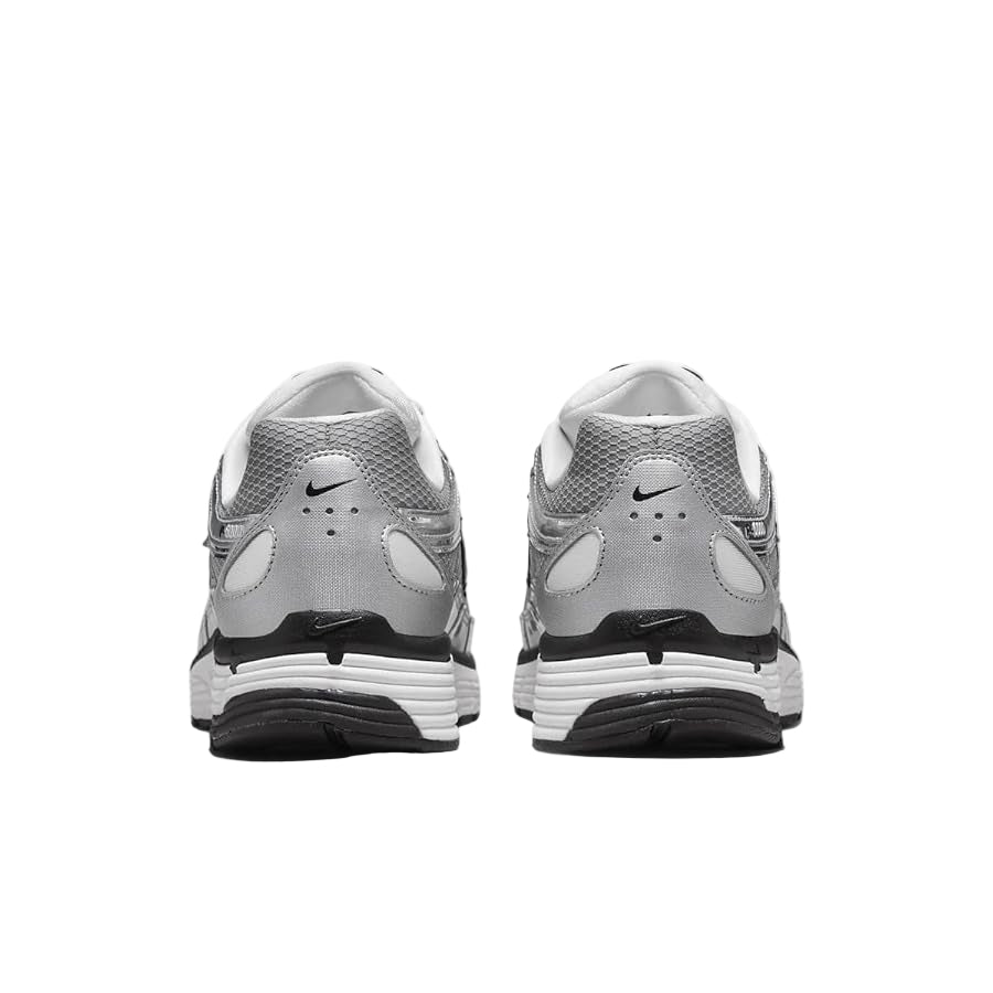 Gray and black Nike sneakers on a white background