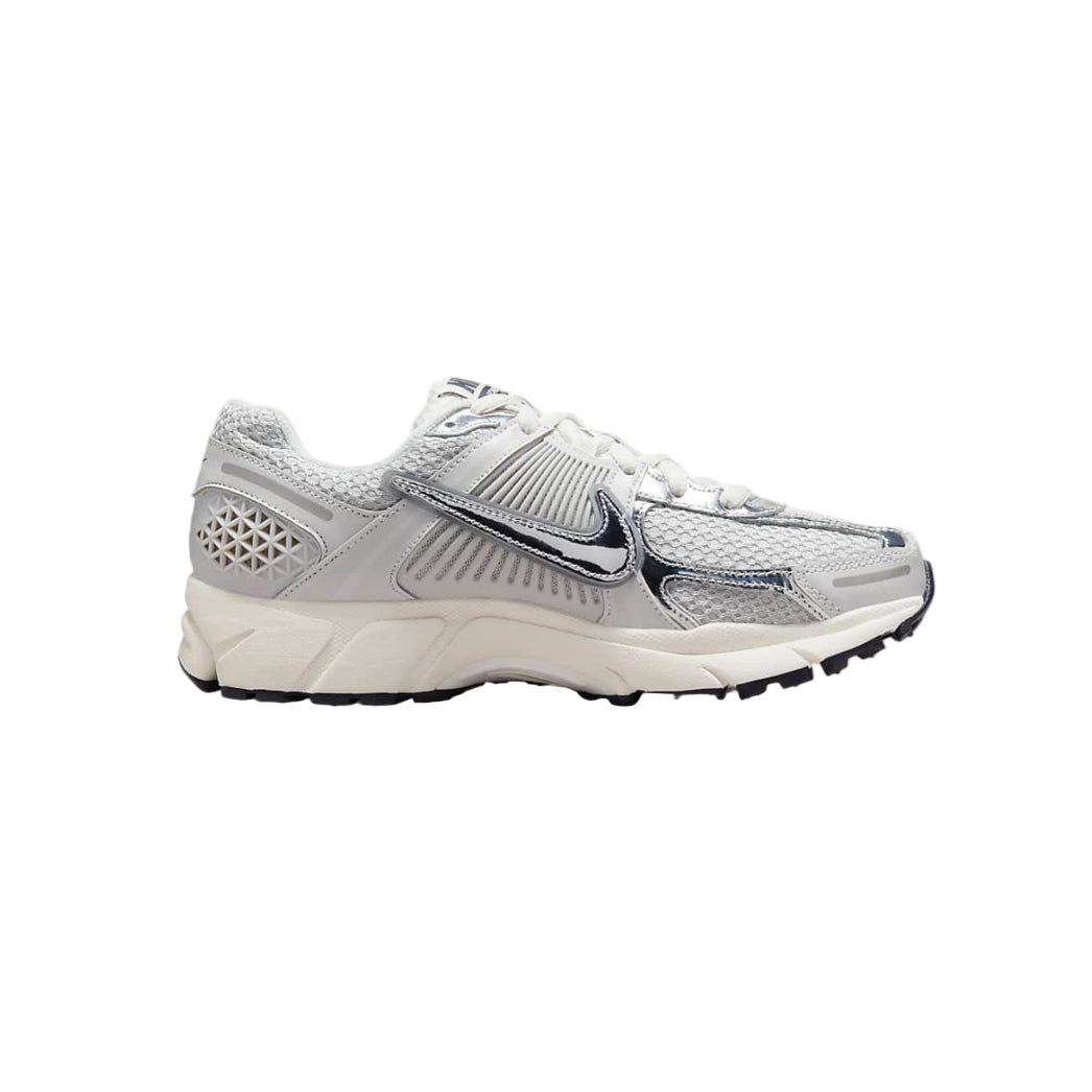 Silver athletic shoe on a white background
