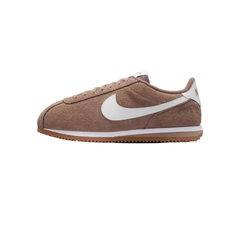 Brown sneaker with white swoosh logo on a white background