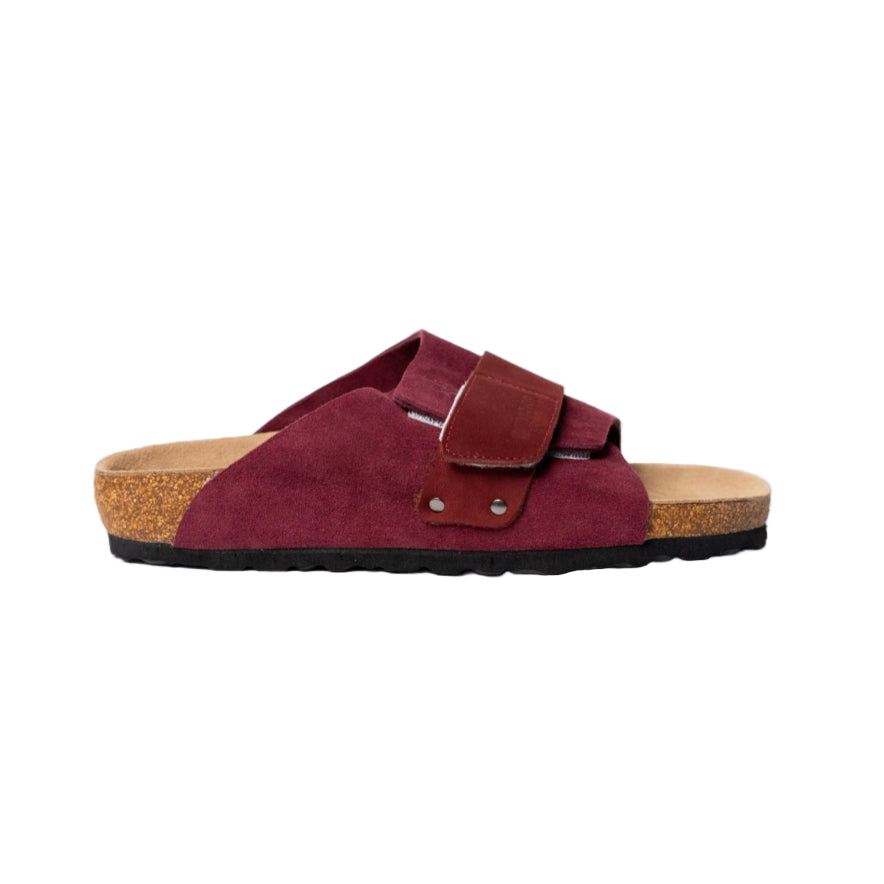Maroon sandal with cork sole on a white background