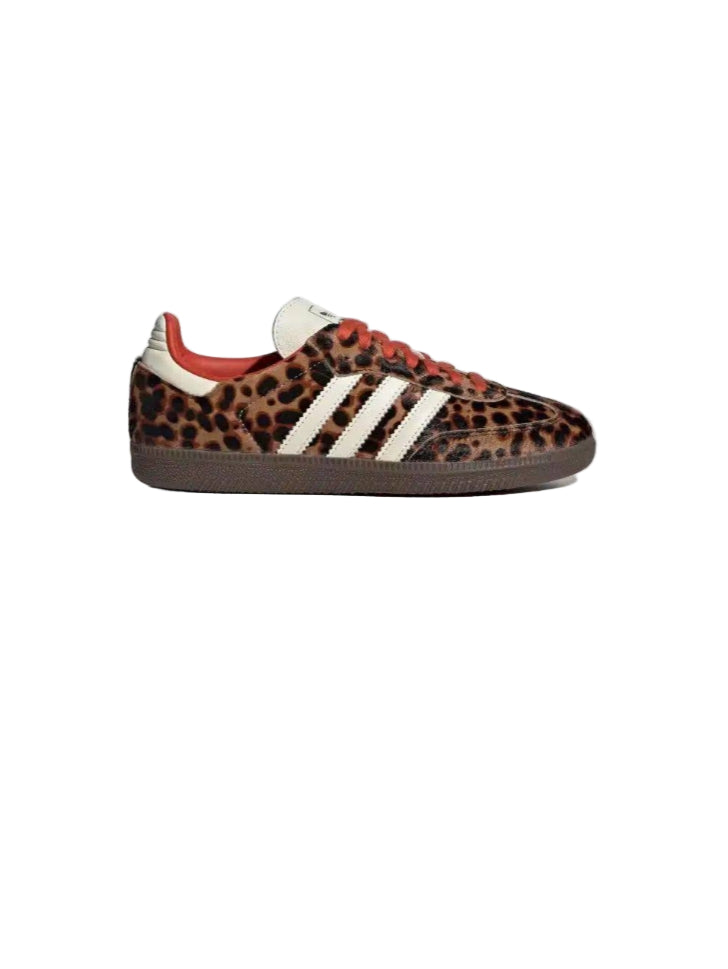 Leopard print sneaker with white stripes on a light gray background