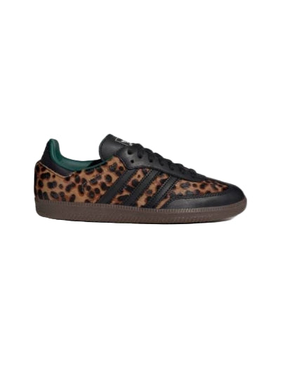 Black sneaker with leopard print pattern on a white background
