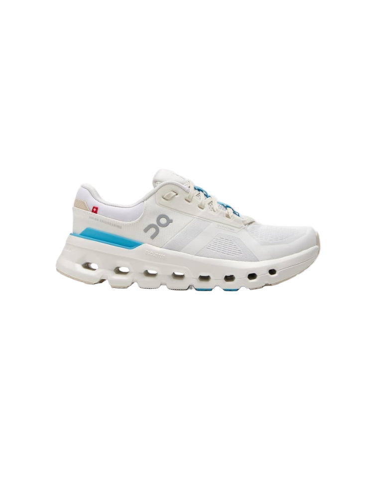 White sneaker with blue accents on a white background