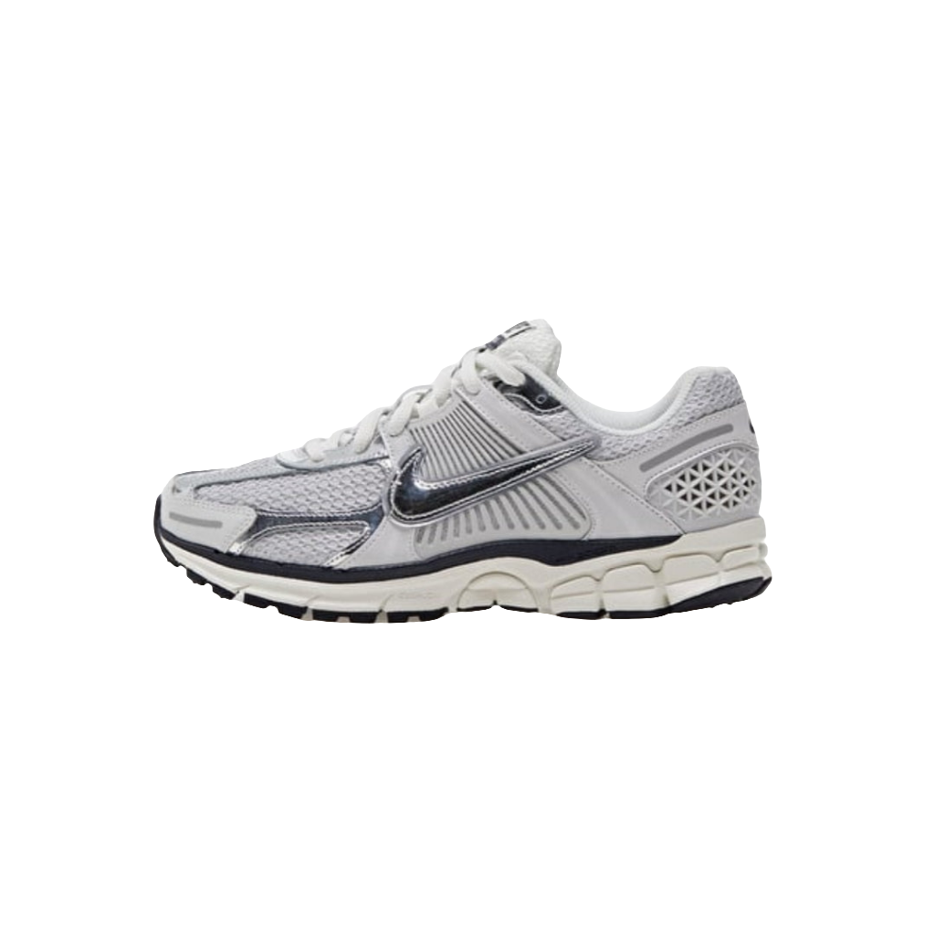 White running shoe with black accents on a white background