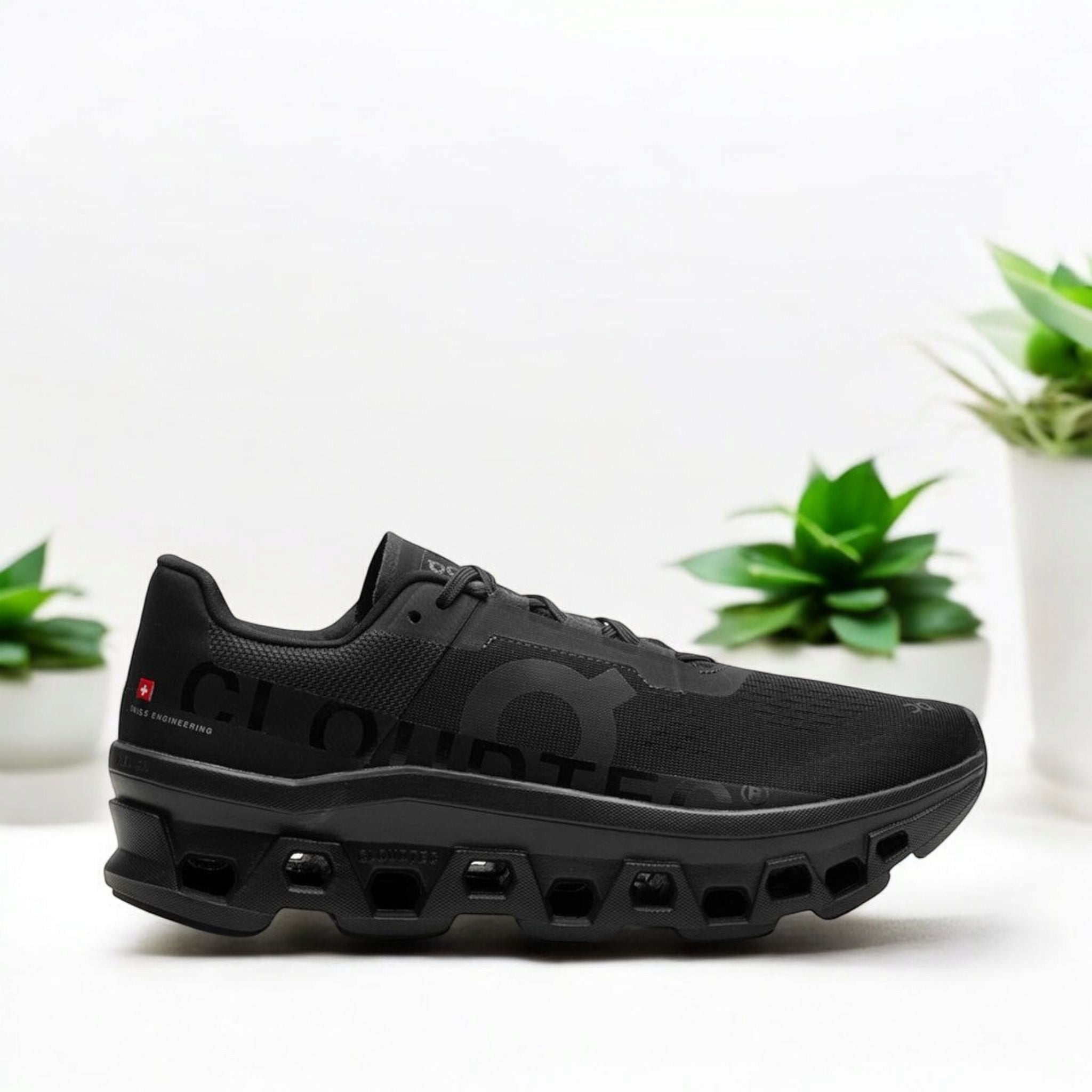 On Running Cloudmonster "All Black" sneakers